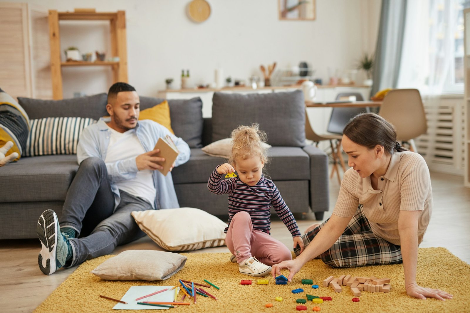 Modern Family Playing with Little Kid at Home