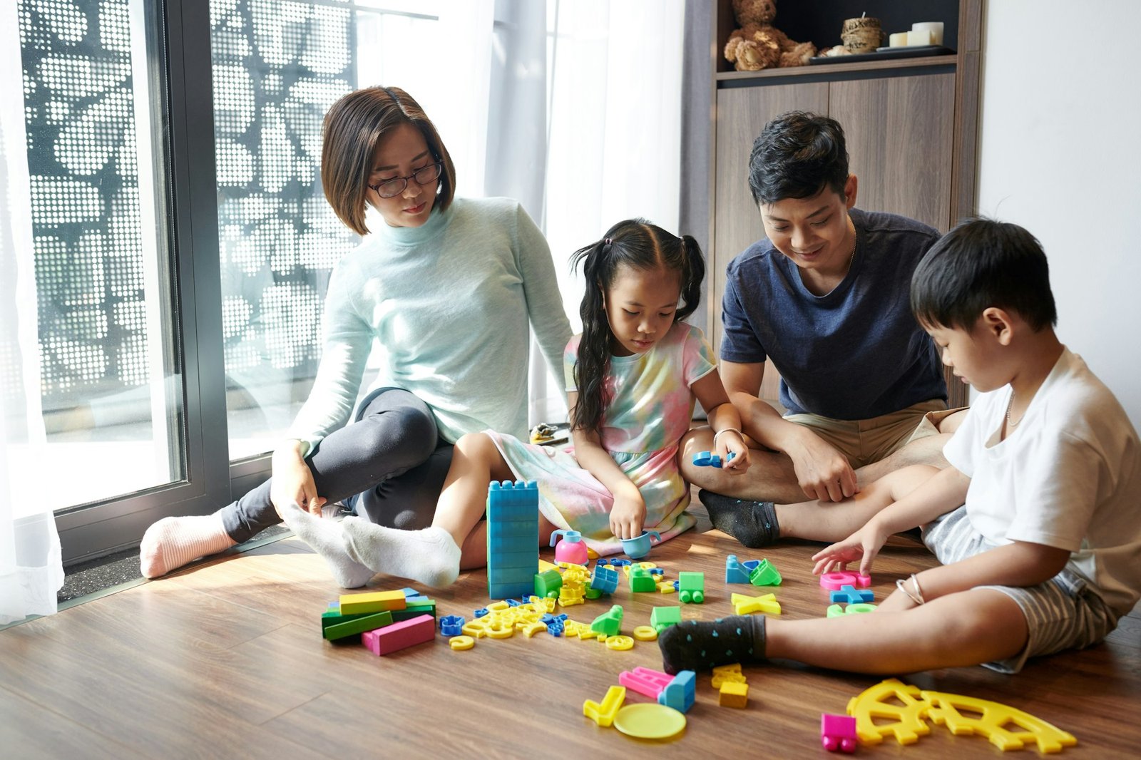 Parents playing with kids